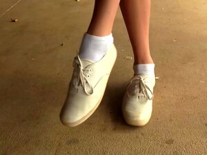 Get Ready To Be Seduced By Our Smoking Hot Cheerleader, Chasity. Watch Her Strut Around In Her Keds Sneakers And White Socks, Teasing You With Her Foot Fetish Moves. This Video Is Pure Fire! Porn