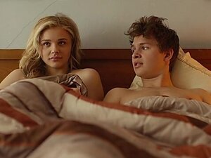 Watch as the cute blonde celebrity engages in an erotic and romantic kissing scene in bed. Experience it in HD quality.